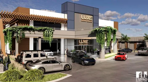 a view of a couch in front of retail shop