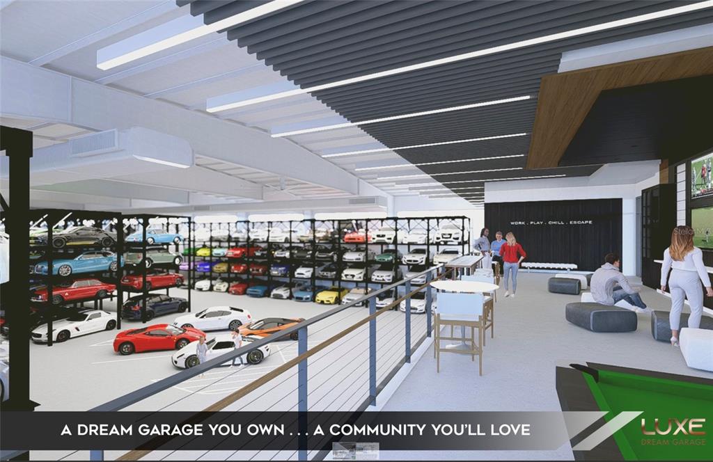 7100 Professional Parkway East, Unit 1 Sarasota, FL 34240 - Photo 7 of 15 a living room with lots of furniture and a chandelier