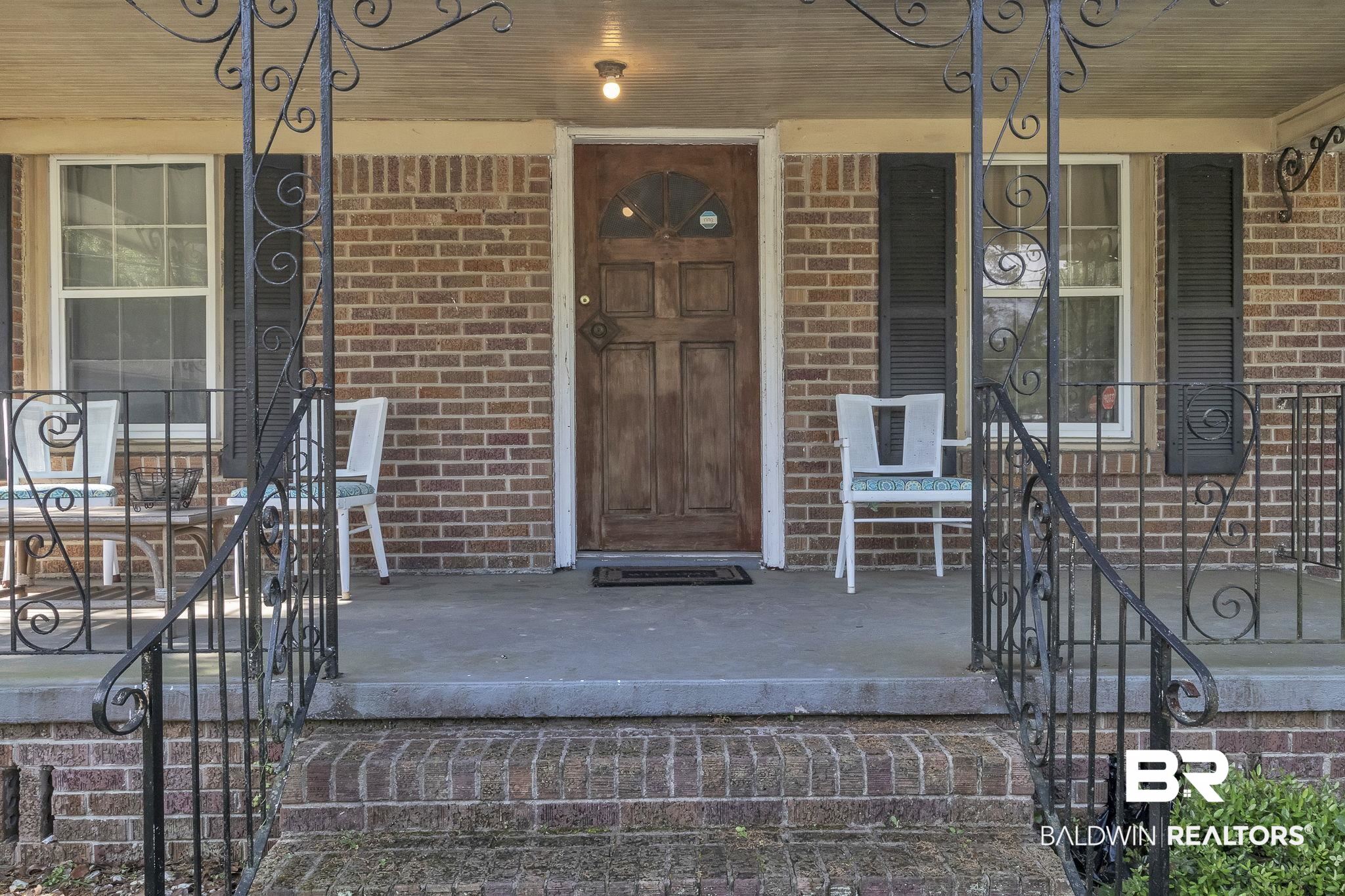 315 Fourth Avenue Chickasaw, AL 36611 - Photo 5 of 28 Entrance to property with a porch and brick siding