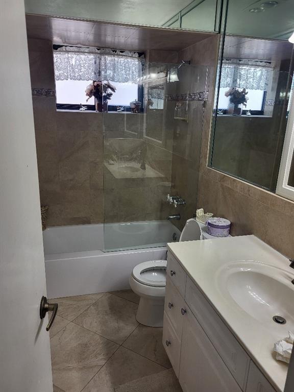 10478 Northwest 4th Street Plantation, FL 33324 - Photo 12 of 15 a bathroom with a sink a toilet and shower