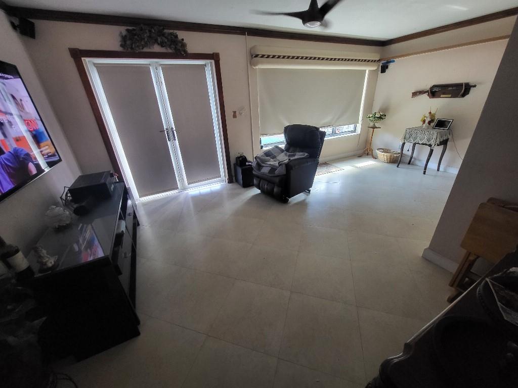 10478 Northwest 4th Street Plantation, FL 33324 - Photo 14 of 15 a view of living room with furniture and a window