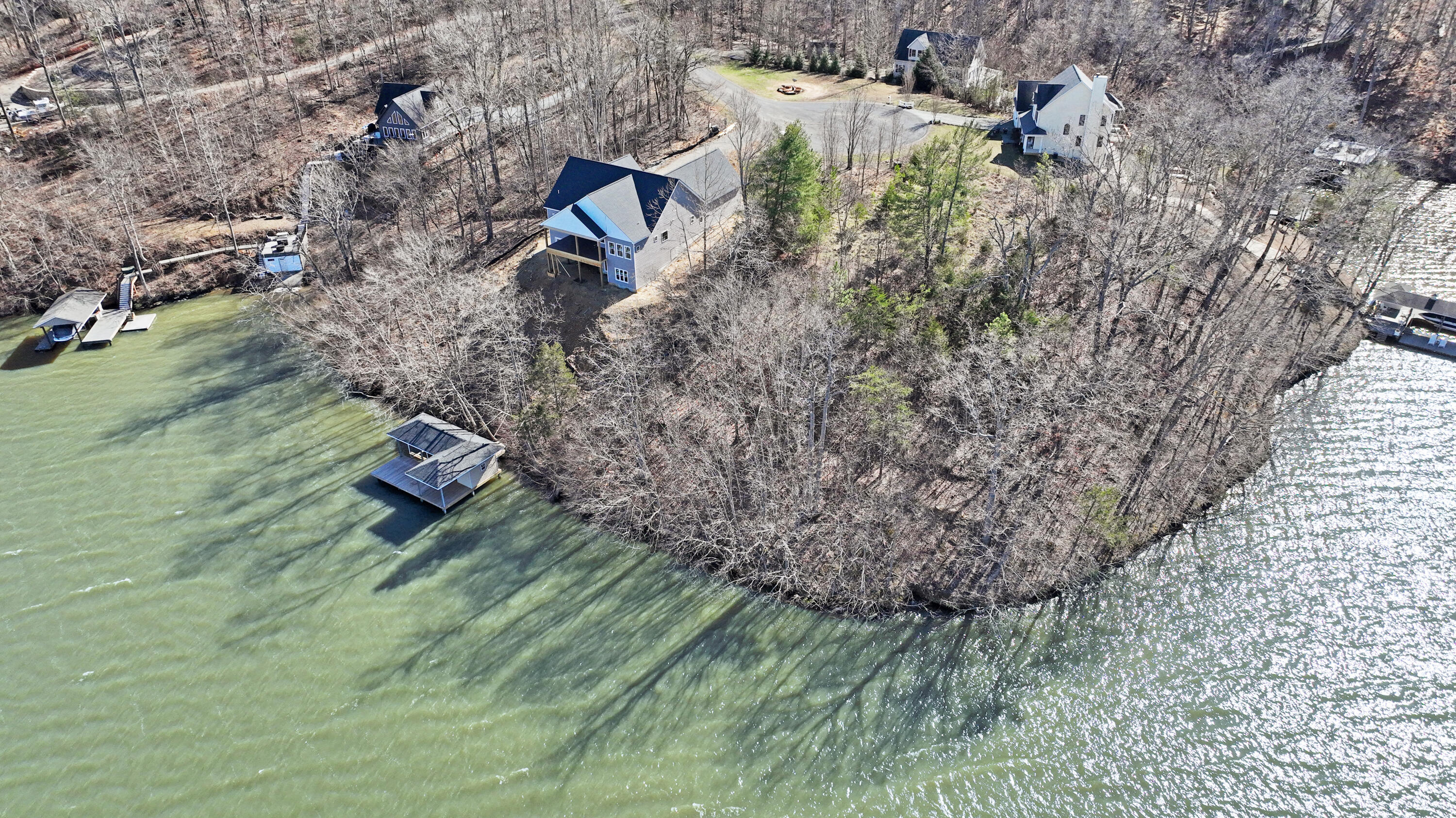 a aerial view of a house with a yard