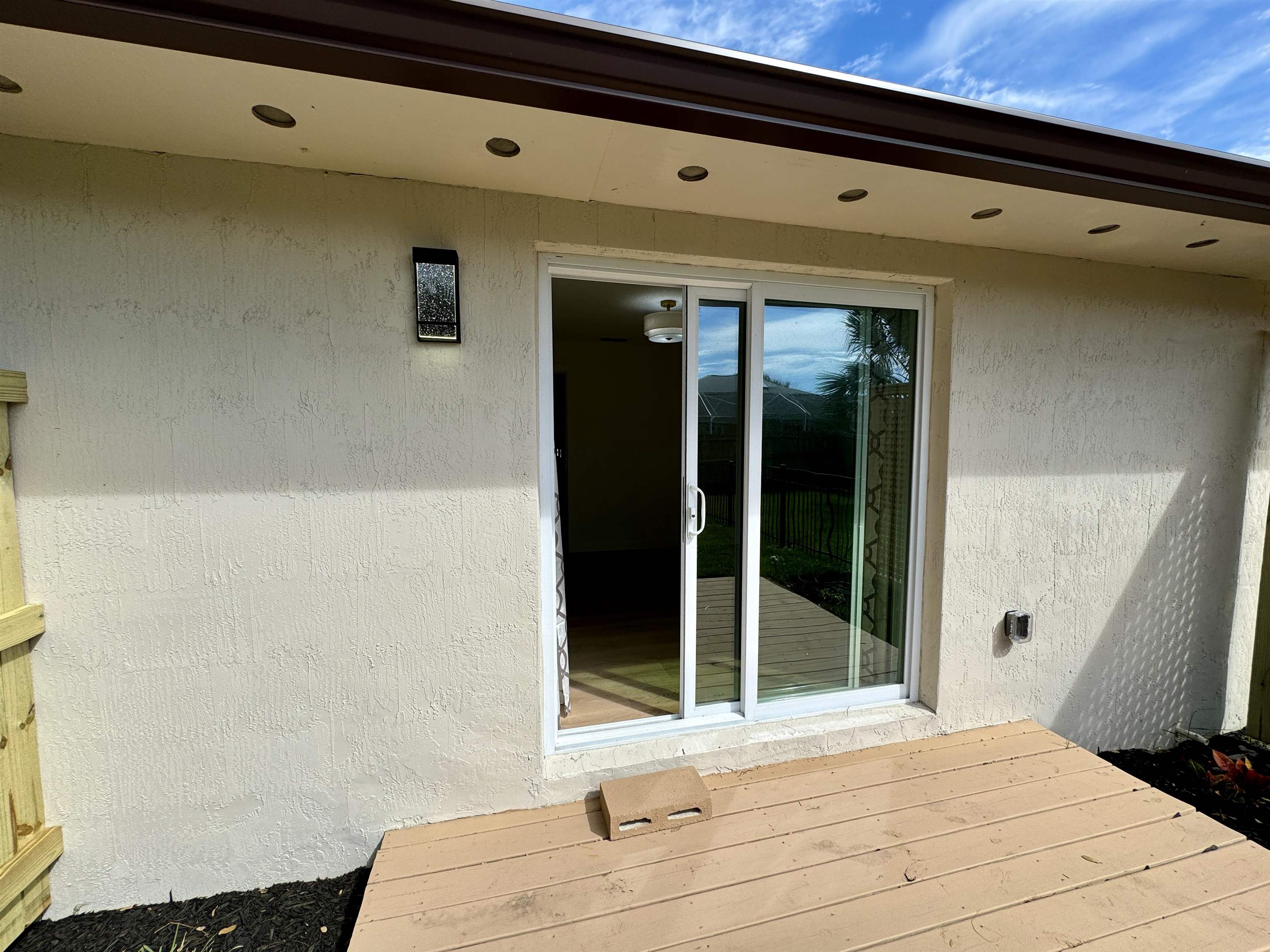 205 6th Street St. Augustine, FL 32080 - Photo 14 of 18 a bathroom with a sink and a large window