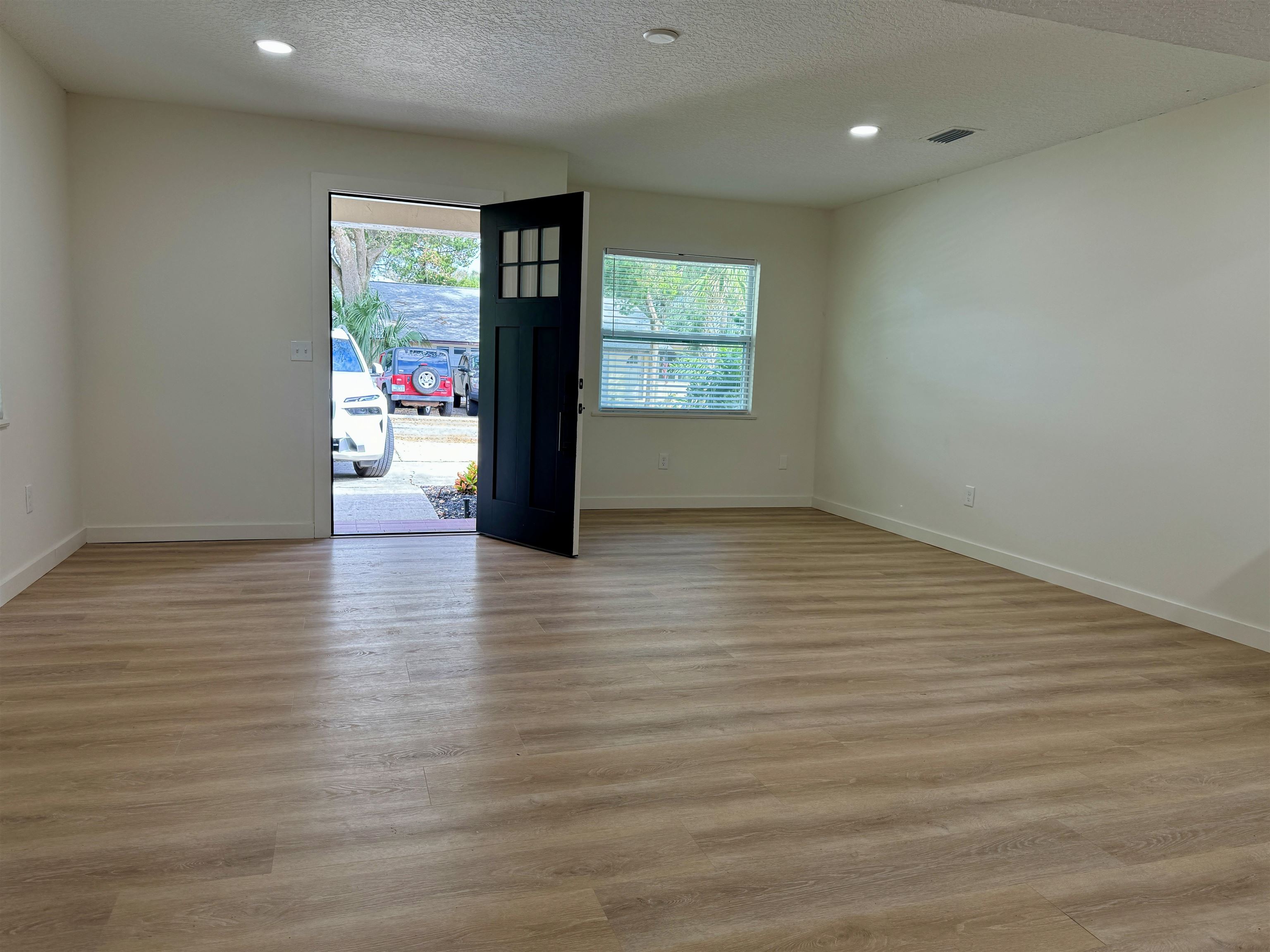 205 6th Street St. Augustine, FL 32080 - Photo 4 of 18 a view of an entryway with wooden floor