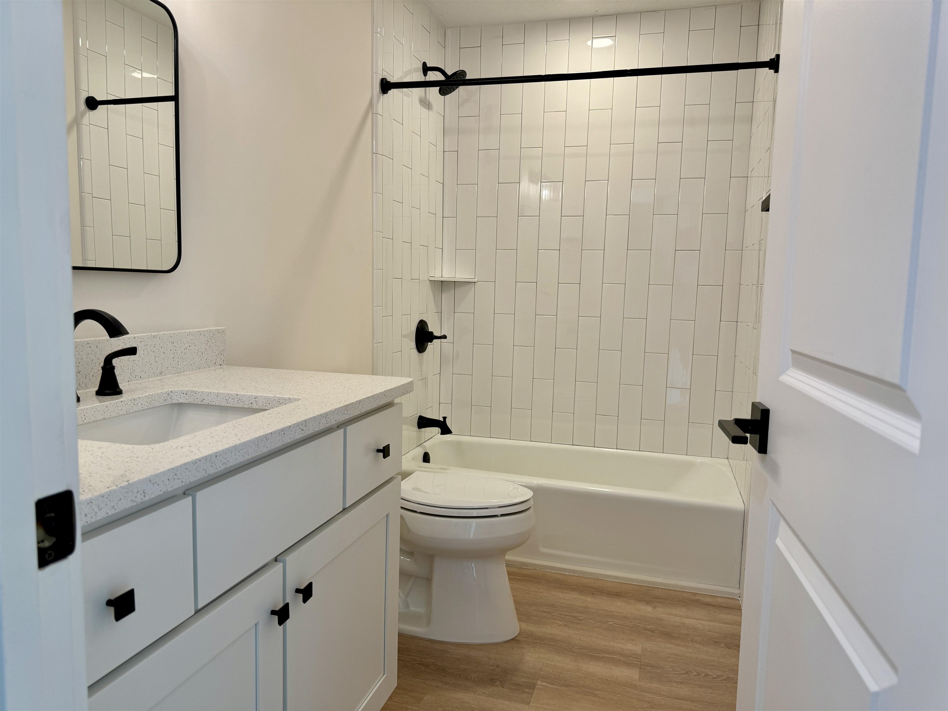 205 6th Street St. Augustine, FL 32080 - Photo 8 of 18 a bathroom with a sink a toilet and shower