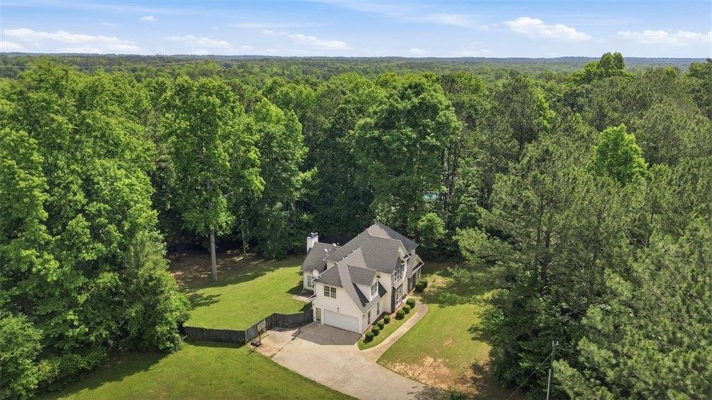 1231 Hillview Road Hampton, GA 30228 - Photo 42 of 49 an aerial view of a house with a yard
