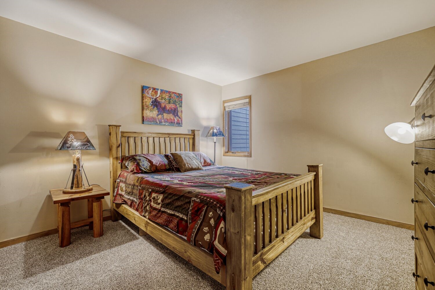 22804 Highway 6, Unit 108 Keystone, CO 80435 - Photo 12 of 28 Bedroom with baseboards and light carpet