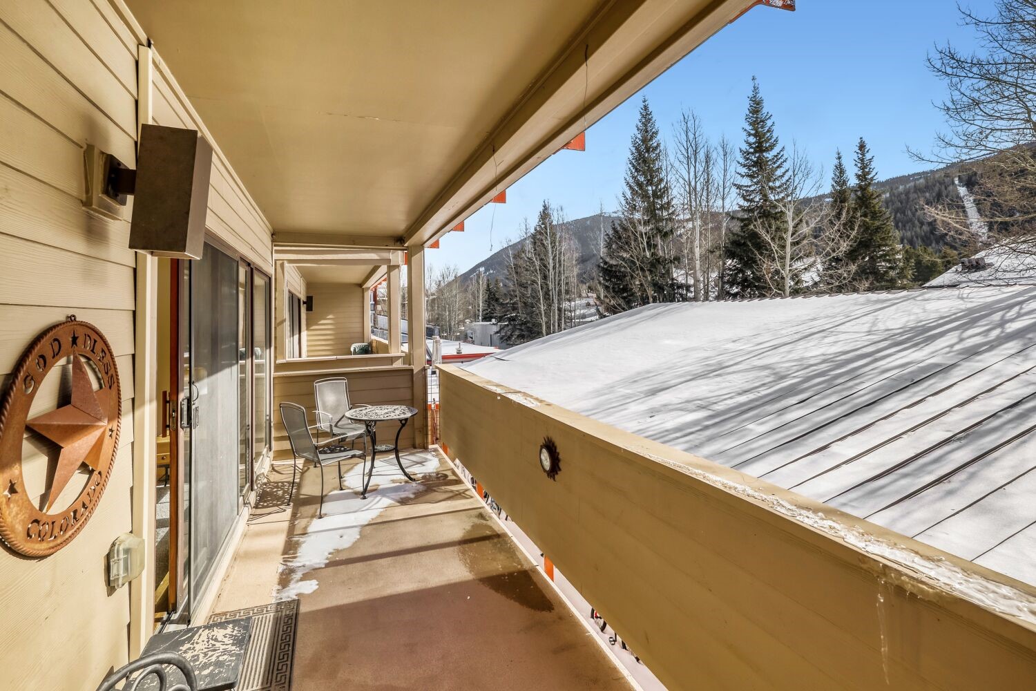 22804 Highway 6, Unit 108 Keystone, CO 80435 - Photo 5 of 28 Snow covered back of property featuring a mountain view
