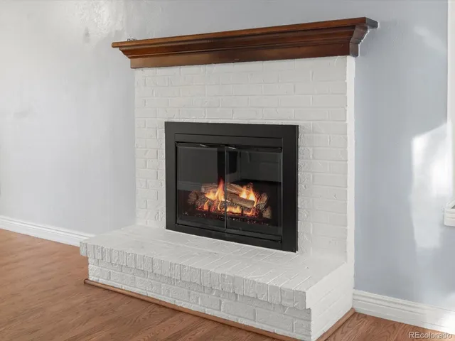 a living room with a fireplace