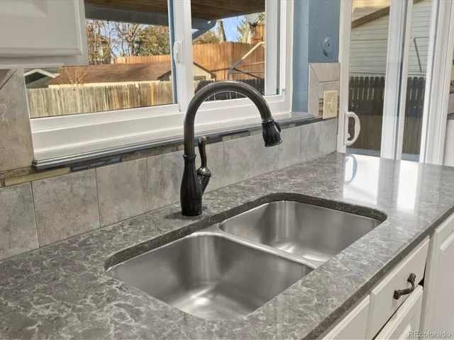 a view closed with a granite countertop sink