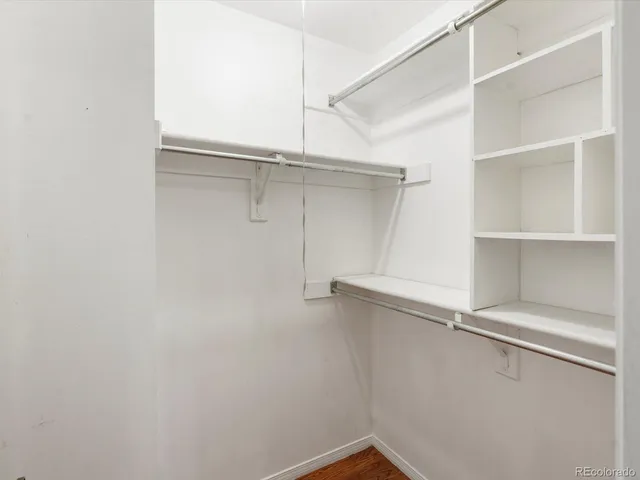 a view of an empty walk in closet