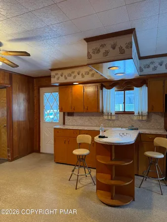 a room with furniture and a clock