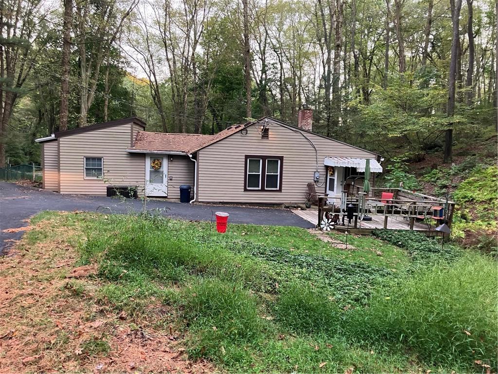 450 Old Plank Road Butler, PA 16002 - Photo 1 of 32 a front view of a house with garden