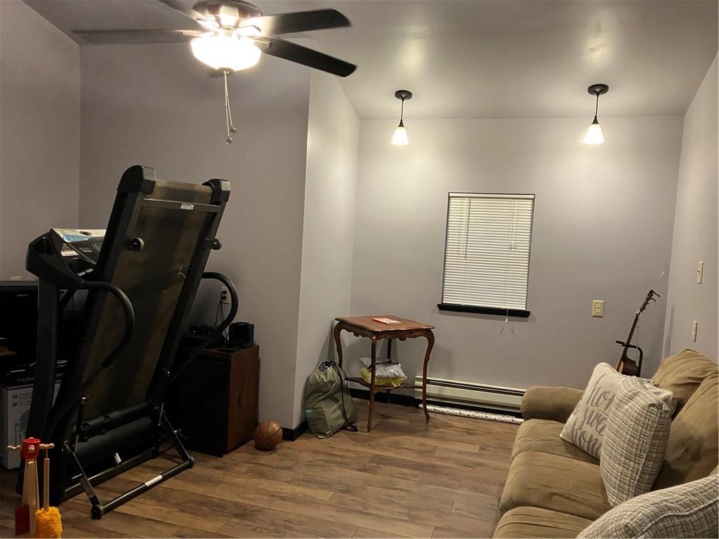 450 Old Plank Road Butler, PA 16002 - Photo 13 of 32 a living room with furniture and a wooden floor