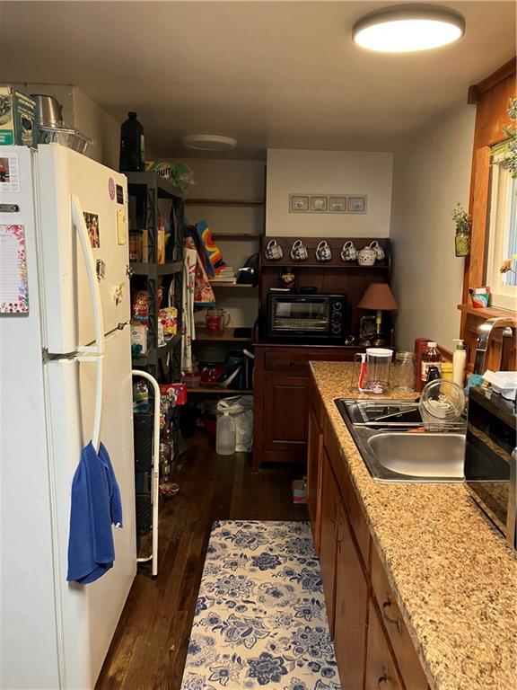 450 Old Plank Road Butler, PA 16002 - Photo 3 of 32 a kitchen with refrigerator and window