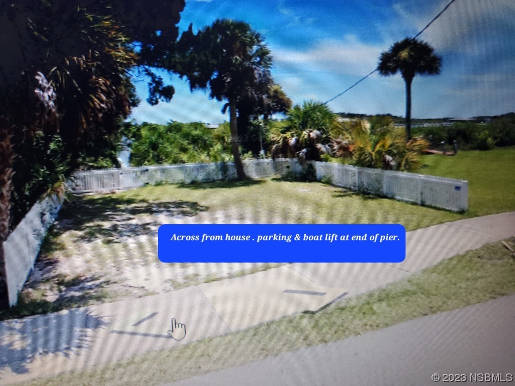 1308 South Riverside Drive Edgewater, FL 32132 - Photo 3 of 16 a view of an outdoor space and yard
