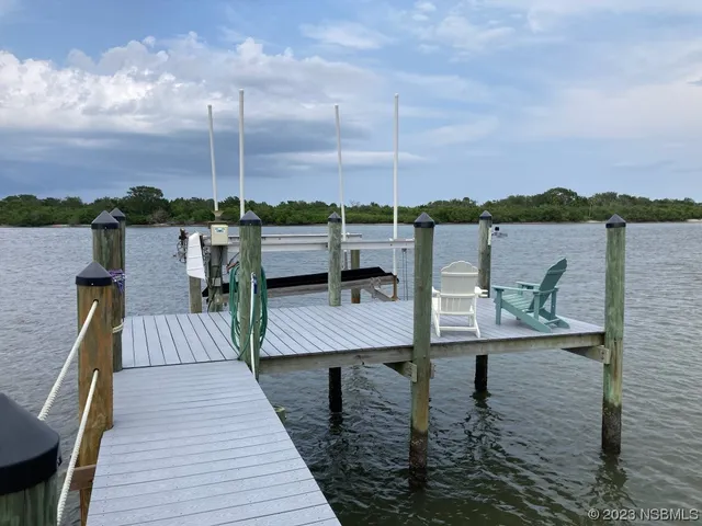 a view of sitting area and lake view