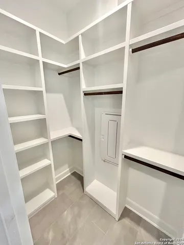 a view of an empty walk in closet