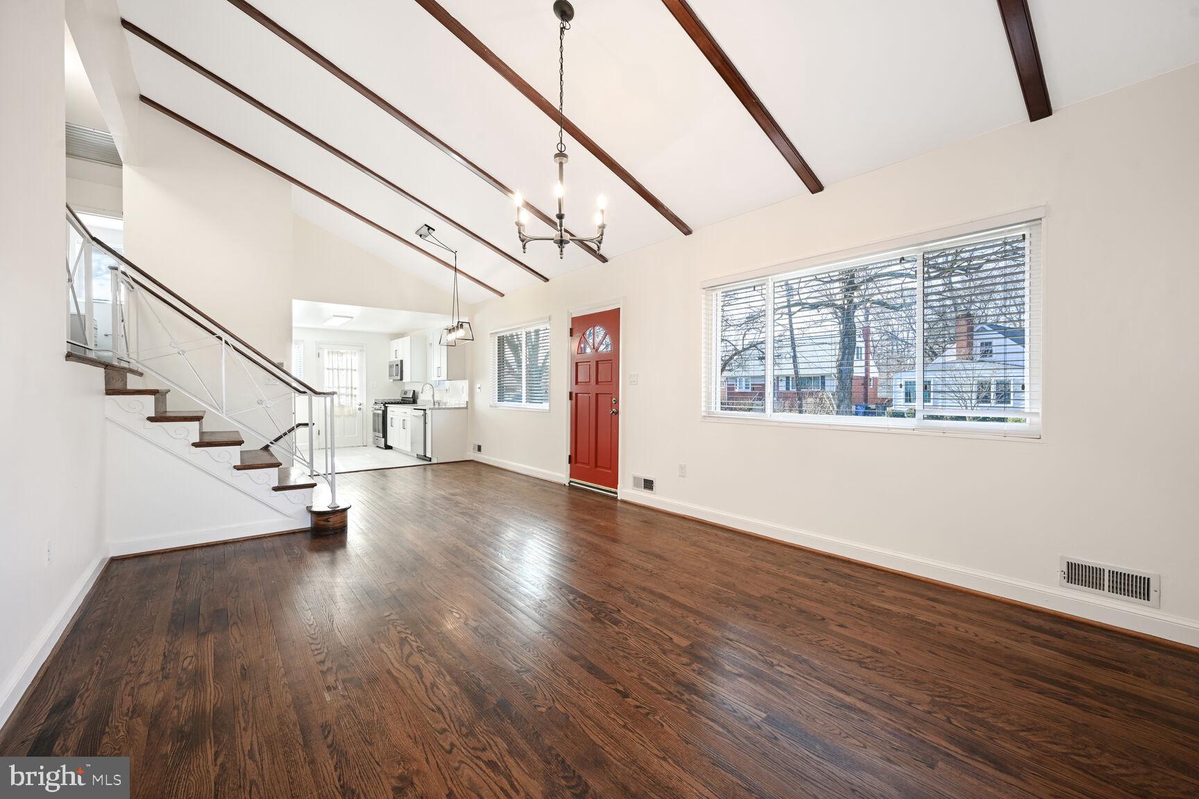 10117 Renfrew Road Silver Spring, MD 20901 - Photo 3 of 15 a view of empty room with wooden floor and fan