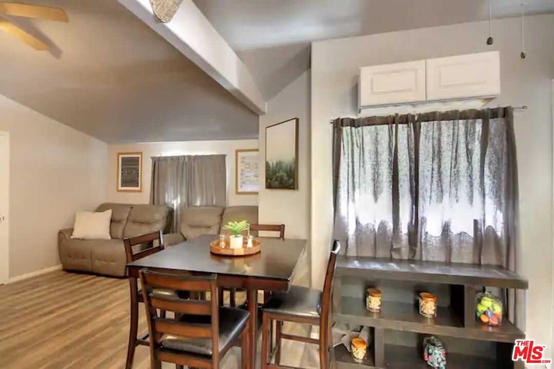 39219 Cedar Dell Road Fawnskin, CA 92333 - Photo 14 of 23 a view of a dining room with furniture