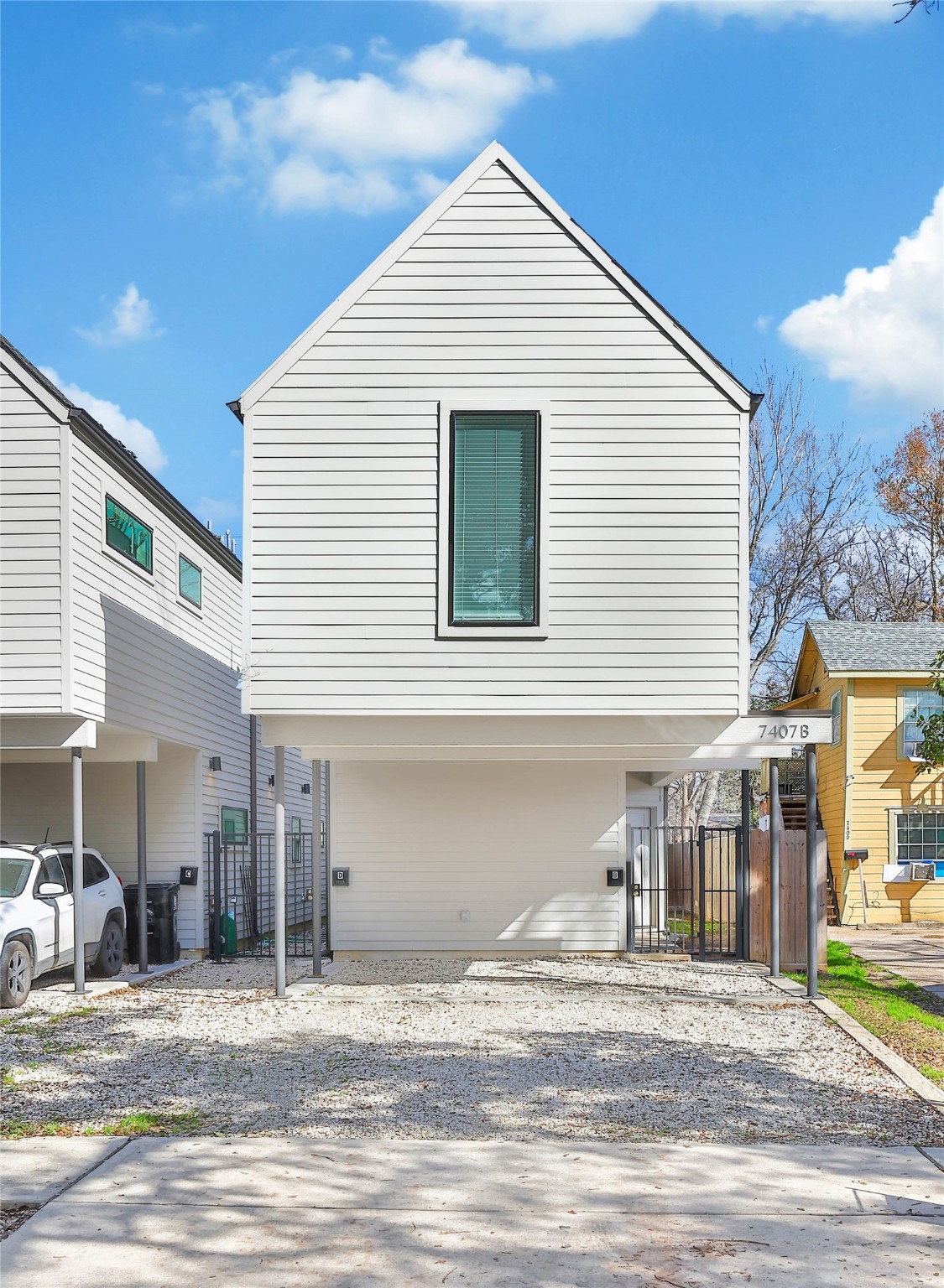 The rental unit C is located at the back of 7407 A. It features covered parking.