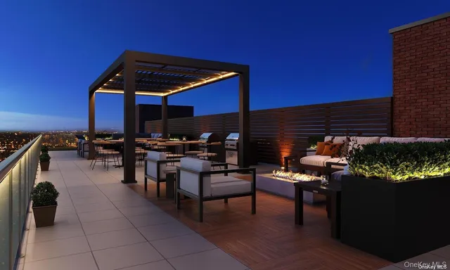 a patio with tables and chairs