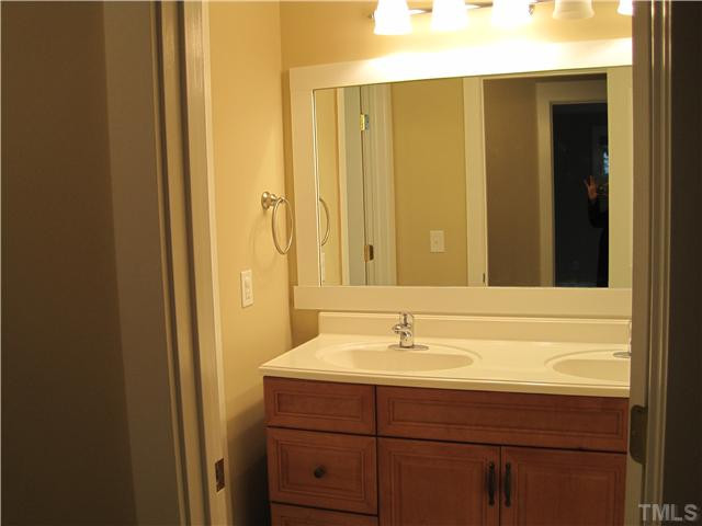 407 Glascock Street Raleigh, NC 27604 - Photo 19 of 25 Bathroom 2 is located at the top of the stairs by Bedrooms 2, 3 and 4. Bathroom