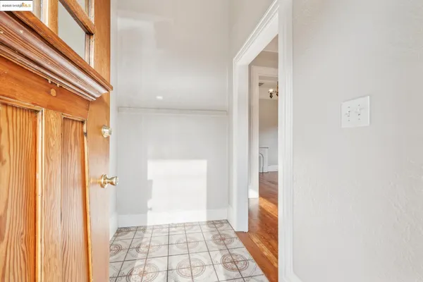 a view of a bathroom with a glass door shower