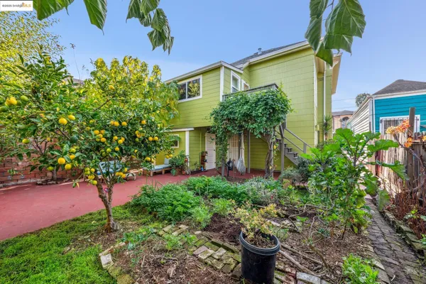 an aerial view of a house with a garden
