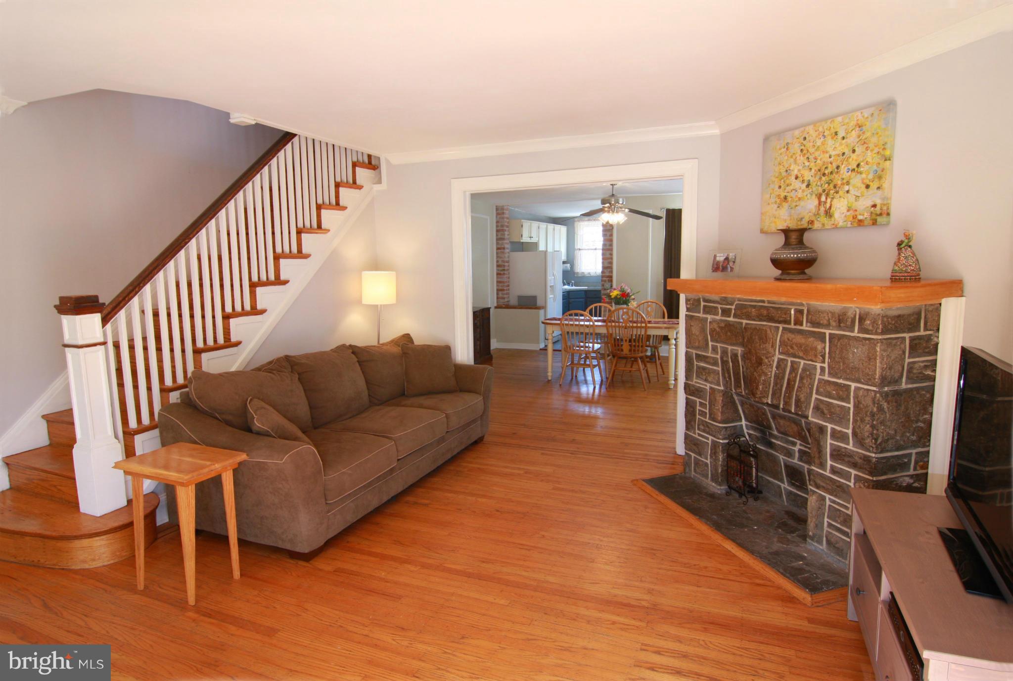 3601 Elkader Road Baltimore, MD 21218 - Photo 3 of 30 Eye-catching decorative fireplace in living room.