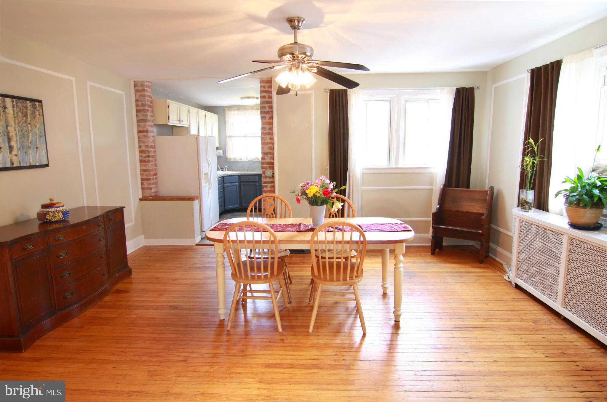 3601 Elkader Road Baltimore, MD 21218 - Photo 8 of 30 Sunlight fills the dining room. A perk of an EOG!