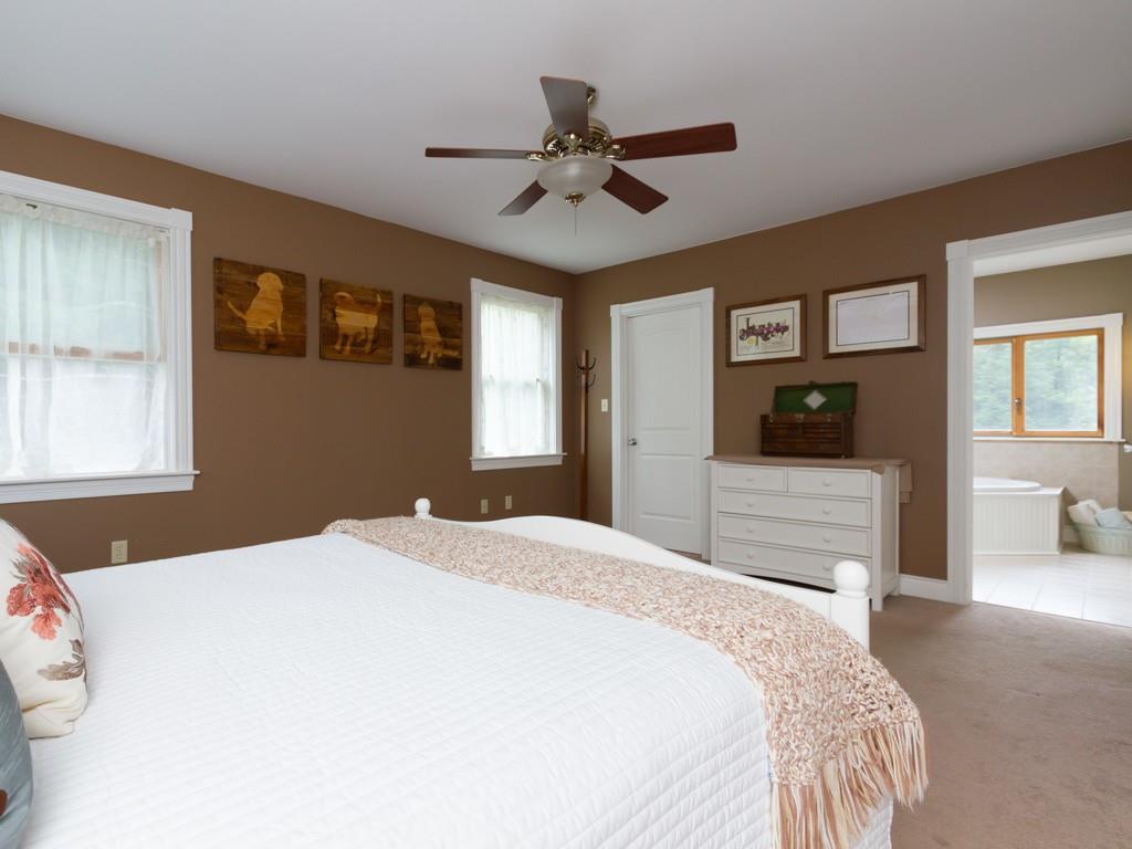 474 Hancock Pond Road Sebago, ME 04029 - Photo 19 of 33 The door to the left is the walk-in...