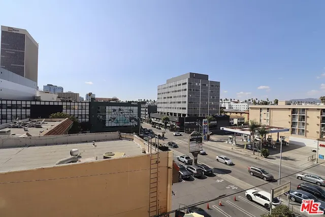 a view of roof with sitting area