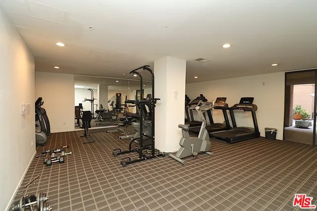 a view of a room with gym equipment