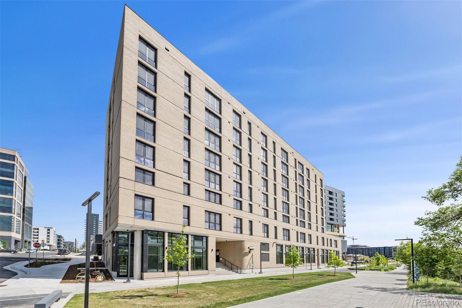 3575 Chestnut Place, Unit 702 Denver, CO 80216 - Photo 8 of 8 a front view of a building