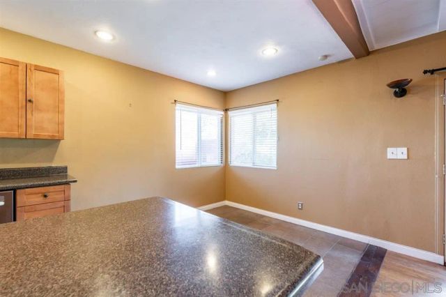 a room with window and a wooden floor