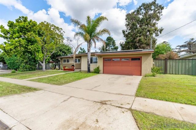 a house view with a garden space