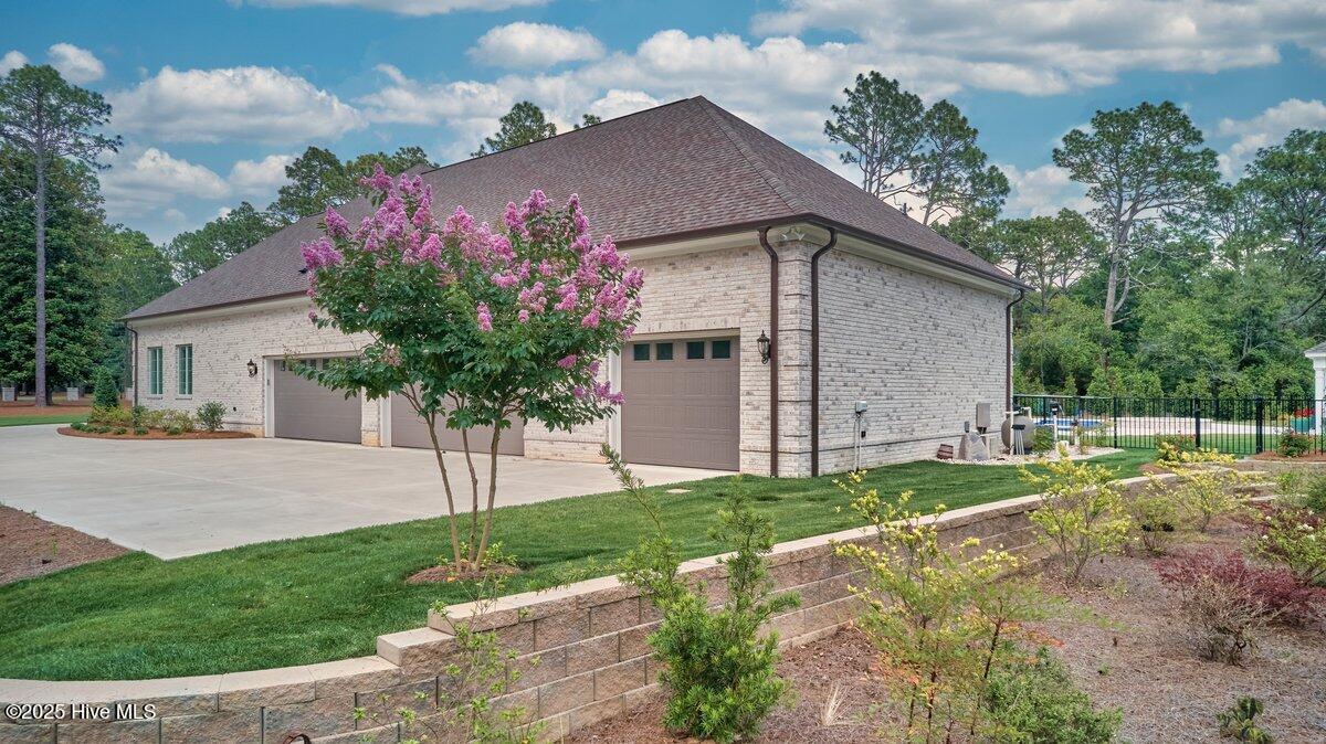 2270 Midland Road Pinehurst, NC 28387 - Photo 86 of 91 Garage and retaining wall