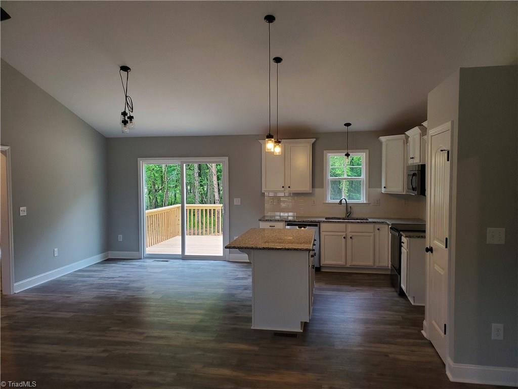 7913 Lester Road Stokesdale, NC 27357 - Photo 2 of 10 View of Kitchen & Dining Area from Front Door