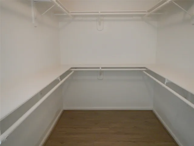 a view of an empty walk in closet
