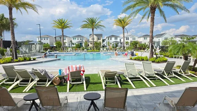 a view of an chairs and tables in the patio