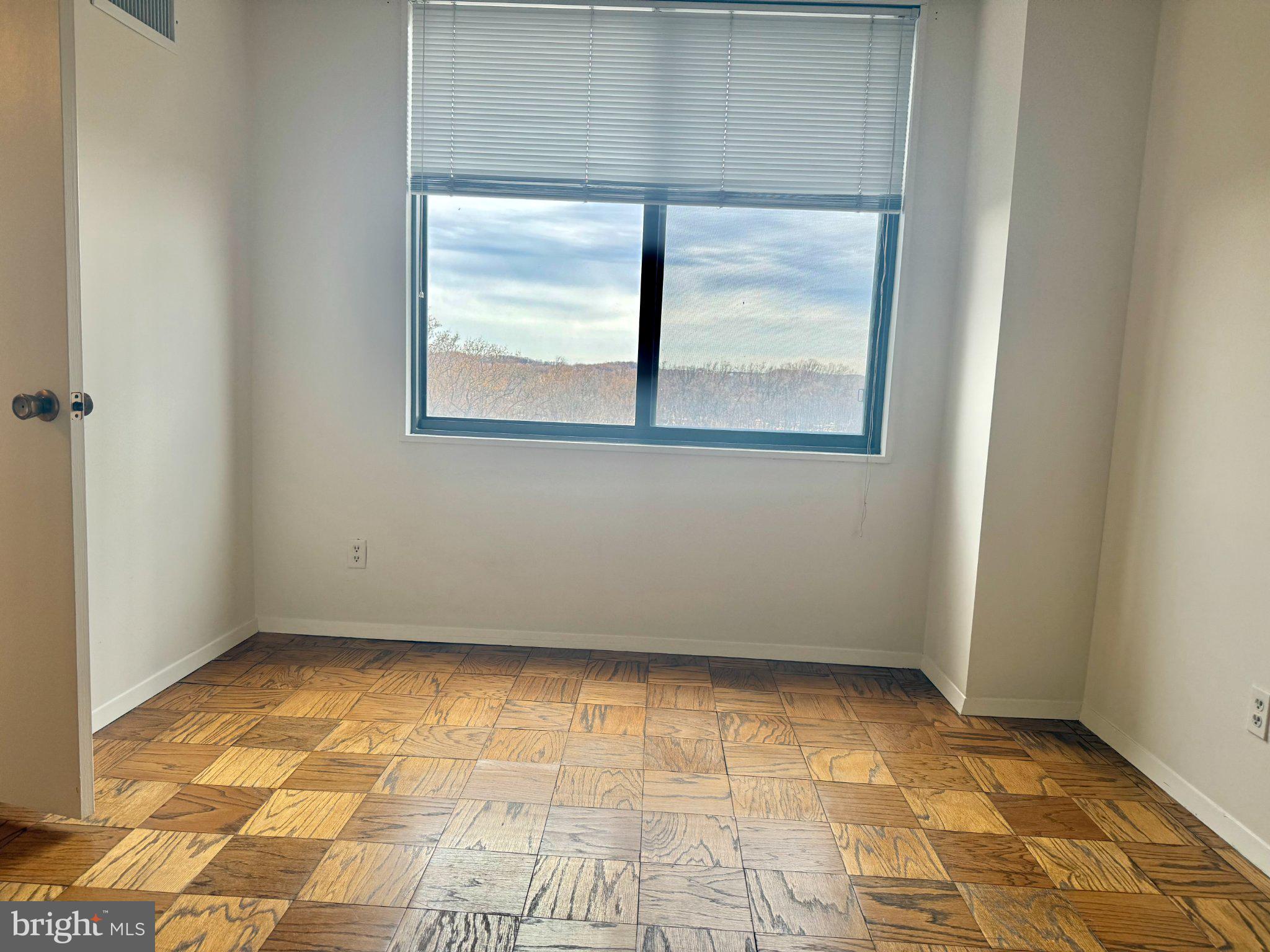 5225 Pooks Hill Road, Unit 1326 Bethesda, MD 20814 - Photo 13 of 24 a view of empty room with window