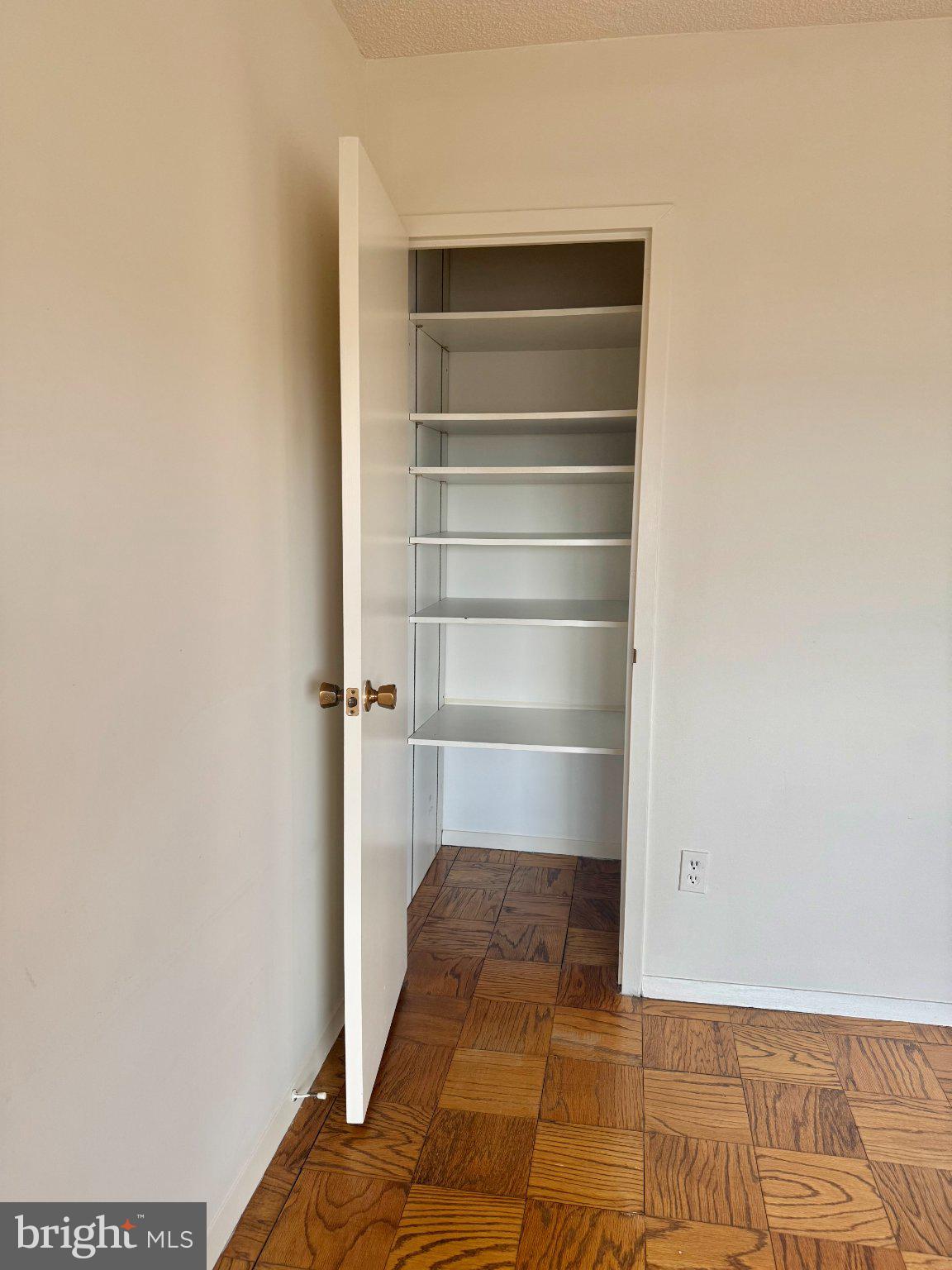 5225 Pooks Hill Road, Unit 1326 Bethesda, MD 20814 - Photo 14 of 24 a room with walk in closet and window