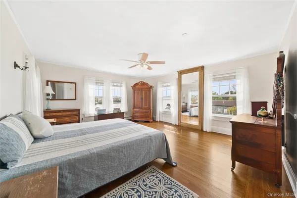 a bed room with bed and window