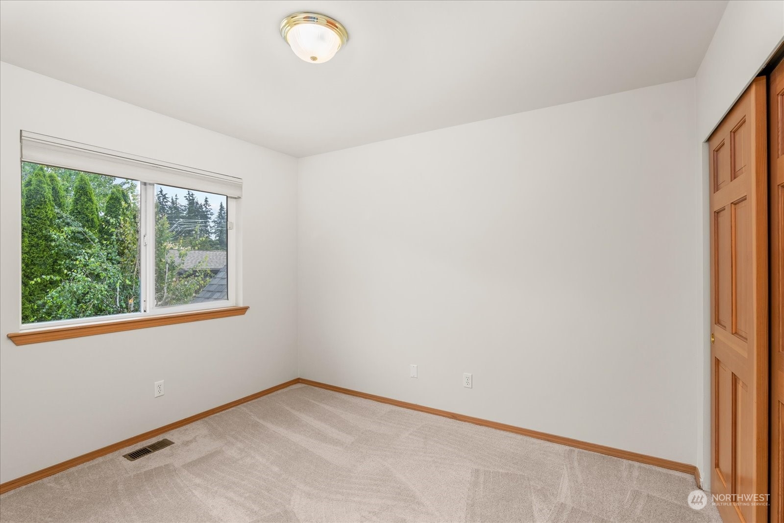 3537 Northeast 24th Court Renton, WA 98056 - Photo 28 of 39 an empty room with windows