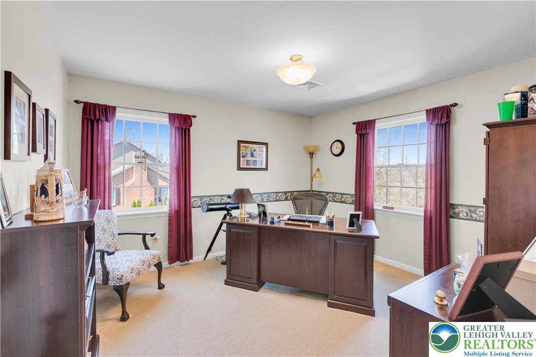 4059 Old Sentry Road Allentown, PA 18104 - Photo 22 of 39 A dedicated home office provides a quiet space for productivity with ample natural light.