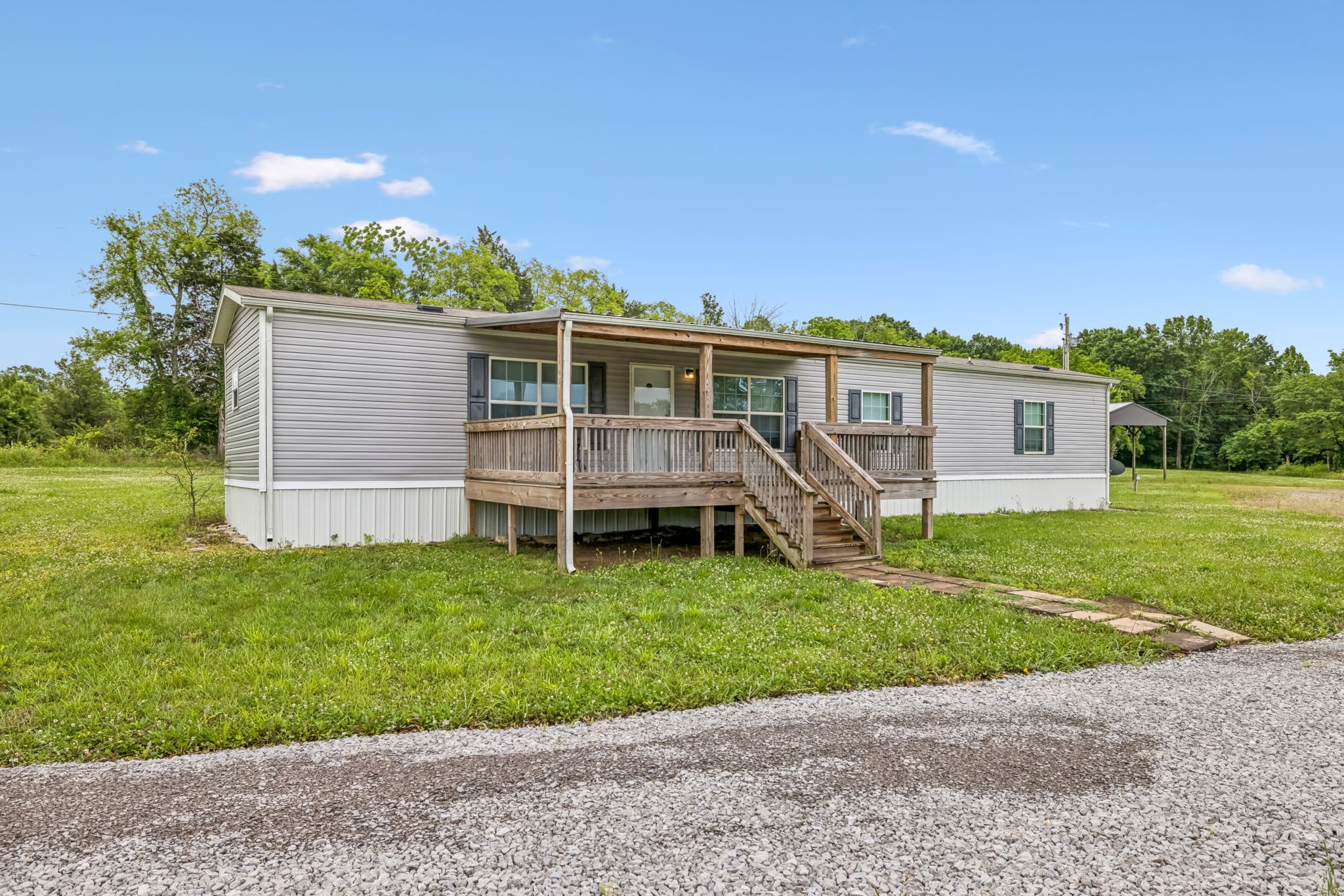 280 Kingdom Road Unionville, TN 37180 - Photo 2 of 65 a view of a house with a backyard