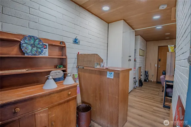 a view of a livingroom with furniture and furniture