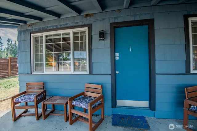 a room that has a table and chair