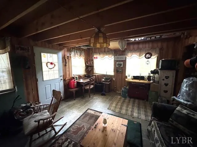 a living room with furniture and a window